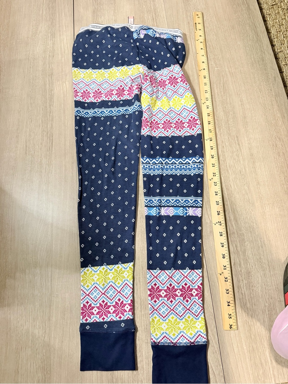 Victoria's Secret Navy Leggings with Pink & Yellow Pattern
